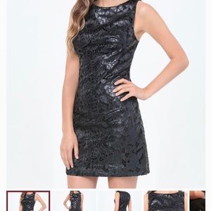 Bebe laser cut faux leather dress